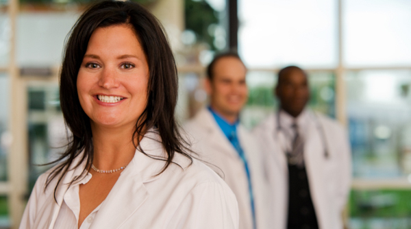 What is the Difference Between an Audiologist and a Hearing Instrument Specialist? three hearing specialists are ready to treat their patients